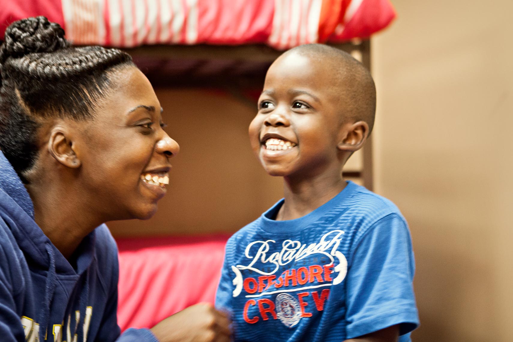 Photography portrait of mother  and  child in homeless shelter, Atlanta