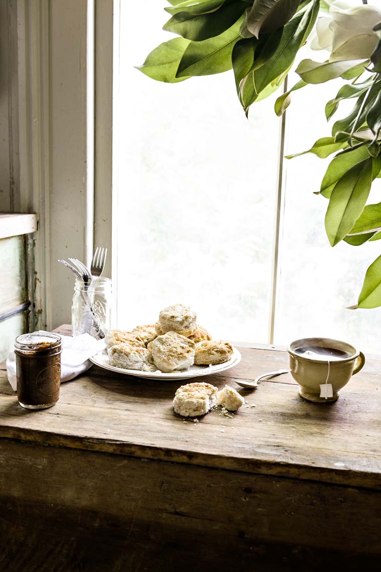 Scones and tea on table by window showing interior design,  Atlanta 